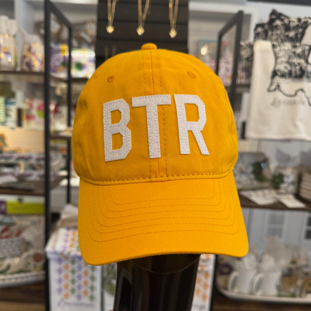 • BTR HAT IN GOLD