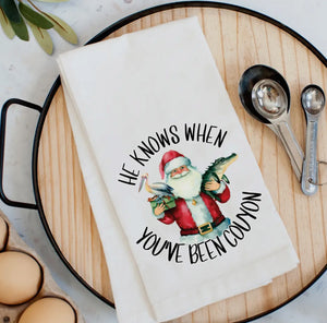 • CHRISTMAS TEA TOWEL - HE KNOWS WHEN YOU’VE BEEN COUYON