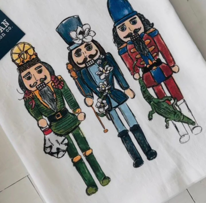 • CHRISTMAS TEA TOWEL - CAJUN NUTCRACKERS